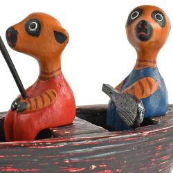 2 Meerkats in a boat hand carved from Albesia wood, 18 x 10 x 5cm