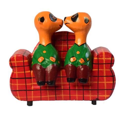 2 Meerkats on a tartan sofa hand carved from Albesia wood