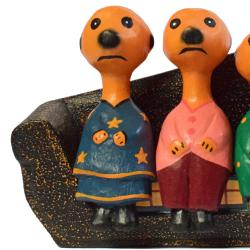 Meerkat family of 5 on sofa hand carved from Albesia wood